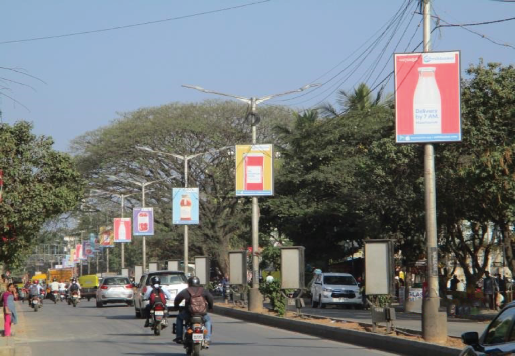 Pole kiosk advertising in Mumbai by ACME Advertising Co., showcasing vibrant street-level branding on high-traffic roads. Pole kiosk advertising in Mumbai by ACME Advertising Co., showcasing vibrant street-level branding on high-traffic roads.