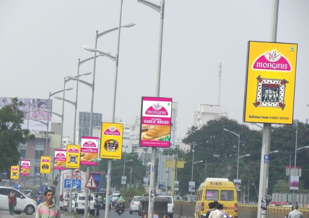 Pole kiosk advertising is a cost-effective OOH format placing eye-catching ads on street poles, ensuring high visibility in urban areas.