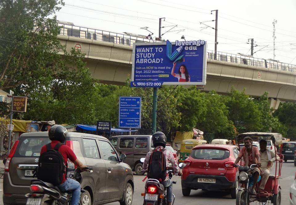 Top Digital Billboard Advertising Companies in Delhi Large outdoor Unipole by Acme Advertiser displayed on a busy roadside, showcasing high-impact hoarding advertising for brand visibility in urban India.Top Digital Billboard Advertising Companies in Delhi