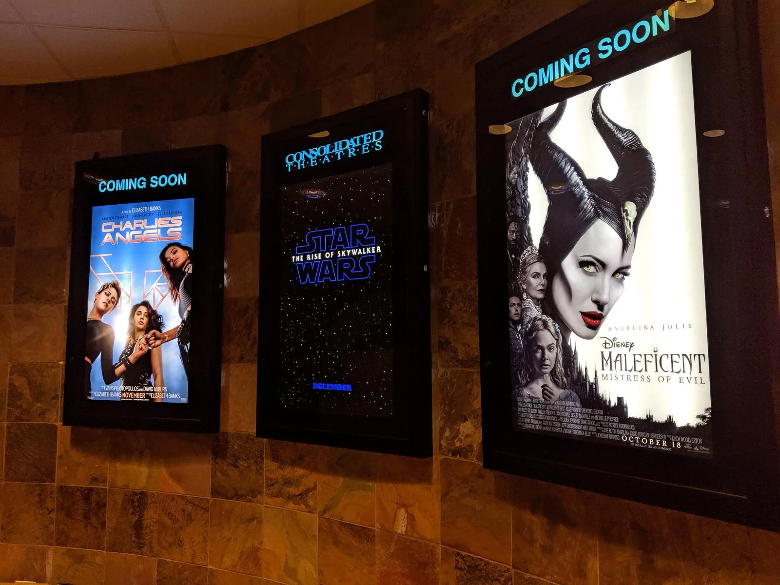 Cinema advertising display on big screen before movie starts, engaging audience with impactful brand message Cinema advertising display on big screen before movie starts, engaging audience with impactful brand message