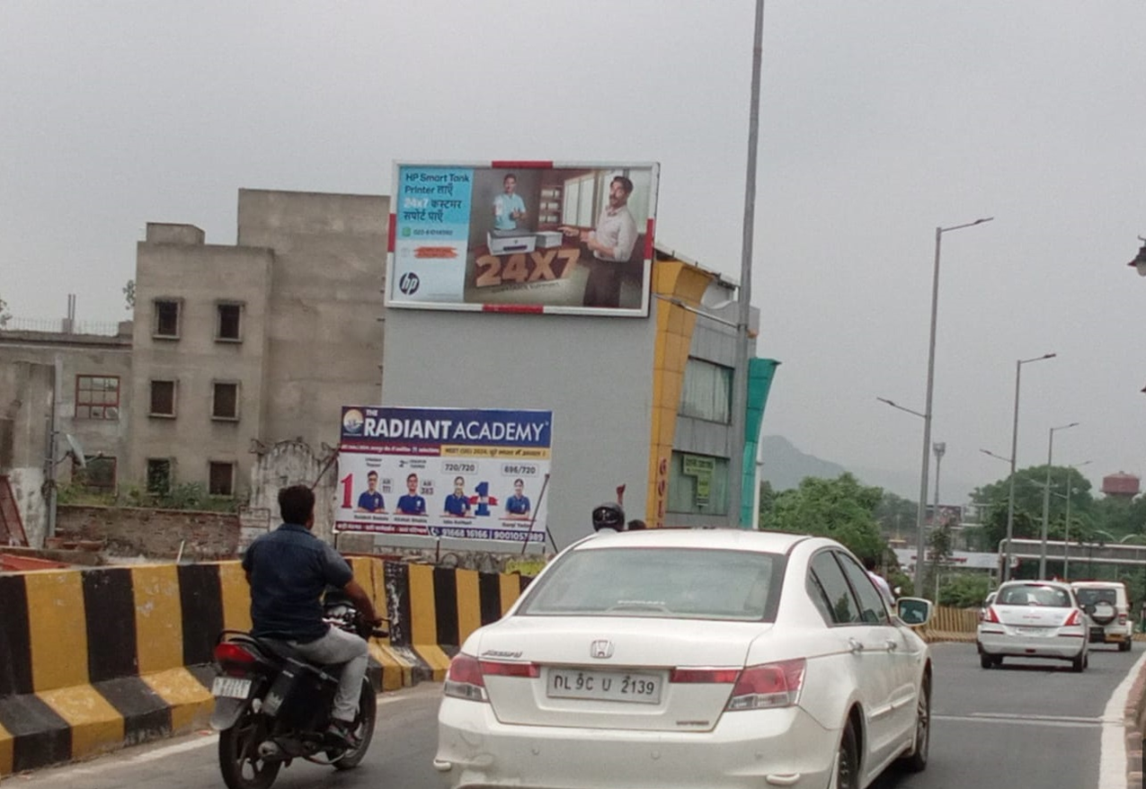 High-impact unipole billboard by leading Unipole Advertising Companies in Rajasthan, strategically placed on a busy highway for maximum brand visibility. High-impact unipole billboard by leading Unipole Advertising Companies in Rajasthan, strategically placed on a busy highway for maximum brand visibility.