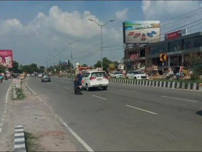 ACME Advertising Co. – Billboard Companies in Lucknow ACME Advertising Co. billboard in Lucknow near BABA CLINIC, showcasing vibrant product ads by top highway hoarding companies in Lucknow.