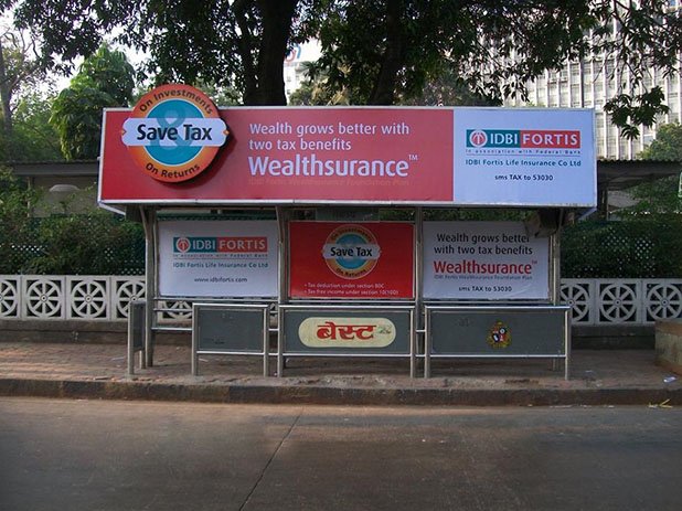 bus shelter branding with Acme Advertising Co. bus shelter branding with Acme Advertising Co.